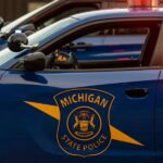 Driver Passed Out in Crashed Vehicle at Gas Station had Loaded Gun - Michigan Police