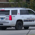 Driver escapes uninjured after vehicle crashes into Lost Creek Reservoir