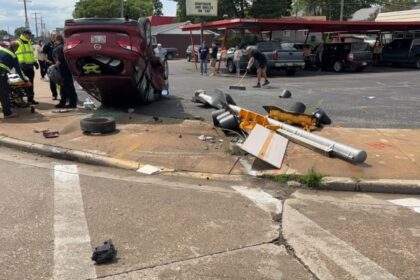 Speeding SUV Flips after Collision with Car in Sparta, Injuring Two - Police